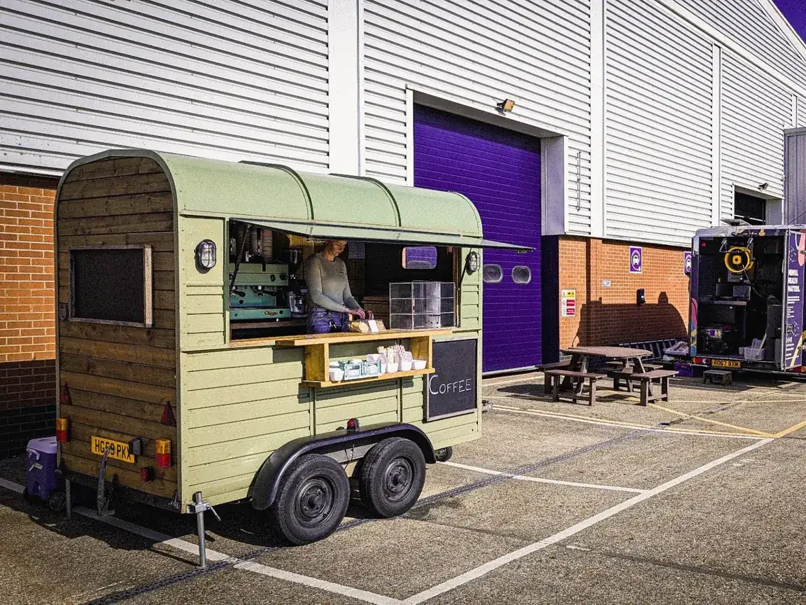 Gallop & Grind coffee trailer serving at a corporate workplace event.